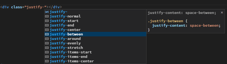 スクリーンショット：VisualStudio Code のHTMLファイル編集画面。class属性にjustify-と入力したところでjustify-normal justify-start などの ユーティリティクラスの入力補完が効いていることが示されている